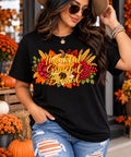 Thankful Grateful Blessed floral fall design modeled on a black shirt