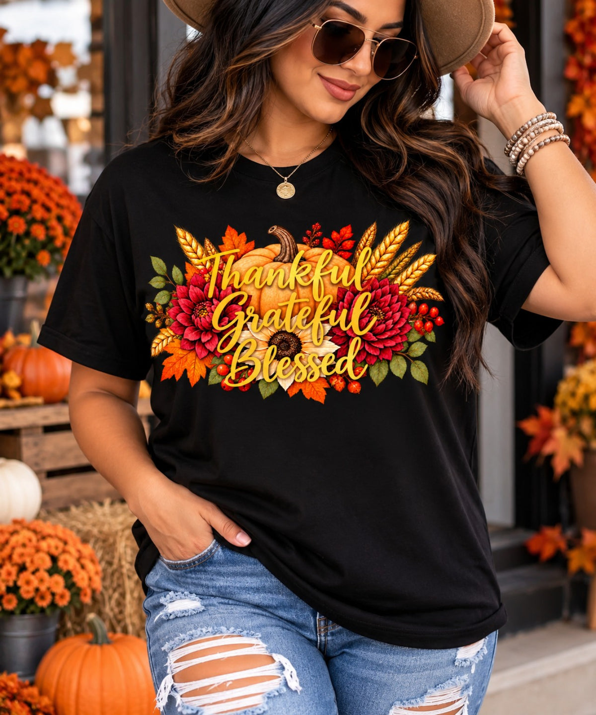 Thankful Grateful Blessed floral fall design modeled on a black shirt